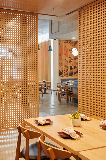 Press kit | 2757-07 - Press release | Ancient Art of Japanese Tattooing Inspires Latest Little Tokyo Restaurant in Los Angeles - Wick Architecture & Design + LAND Design Studio - Commercial Architecture -      David Wick and Andrew Lindley delineated the private dining room at Sake Dojo with floor-to-ceiling sliding perforated panels.     - Photo credit: Nicole LaMotte Photography