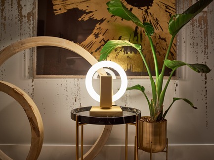 Press kit | 3412-02 - Press release | Karice, Award Winning Designer Unveils its Latest Luminaire - Olah Table Lamp - Karice Enterprises Ltd. - Product - Olah Table Lamp - placed on a side table toning in with gold accents - Photo credit: Jordan N. Dery