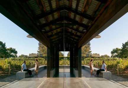 Press kit | 3353-01 - Press release | WDA Honoredwith Merit Award byAIA San Francisco - WDA (William Duff Architects) - Residential Architecture -  The barn – relocated in its entirety to its current location on a seven-acre property in Napa Valley – sits atop a new concrete plinth that rises at either end to create seating areas.    - Photo credit: Matthew Millman Photography