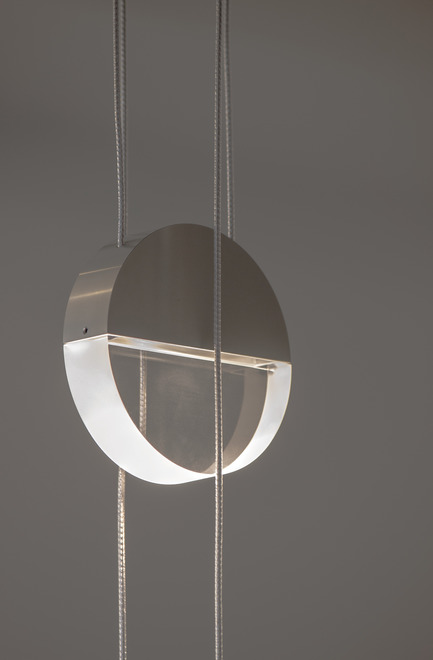 Press kit | 2024-01 - Press release | Canadian Lighting Company Archilume Unveils Three New LED Luminaire Lines at  ICFF May 20-23, 2018 - Archilume - Lighting Design - Balance consists of a pair of disc shapes suspended by twinned cables, one beneath the other, hung in perpendicular directions. - Photo credit: Archilume