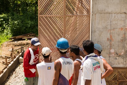 Press kit | 3162-01 - Press release | Streetlight Tagpuro - Eriksson Furunes Architecture, Leandro V. Locsin Partners & Boase - Institutional Architecture -  The fathers evaluating the prototype design of the doors they made.<br>  - Photo credit:  Alexander Eriksson Furunes 