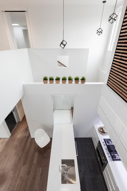 Press kit | 3057-01 - Press release | Flipped House - Atelier RZLBD - Residential Architecture - Flipped House, looking from the family room towards the kitchen - Photo credit: Borxu