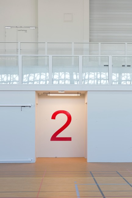 Press kit | 921-10 - Press release | Sports Hall of the Jean-Louis Trintignant Middle School in Uzès - France - NBJ architectes - Institutional Architecture - View of the bleachers - Photo credit: ©photoarchitecture.com