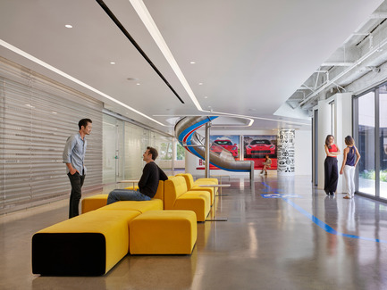 Press kit | 2222-01 - Press release | EdQuarters - M+M Creative Studio - Commercial Interior Design - Main conferencing area with yellow sofa seating and lounge area in foreground. 