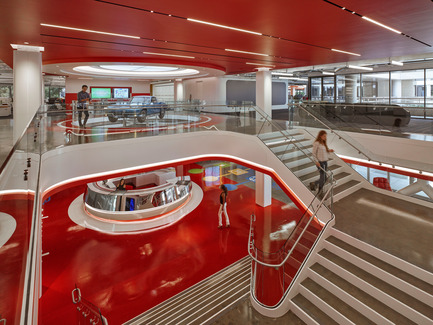 Press kit | 2222-01 - Press release | EdQuarters - M+M Creative Studio - Commercial Interior Design - Main connecting stair to 2nd floor - showing reception desk on first floor and 1966 Corvette (mounted directly on top of the 2016) - Photo credit: Benny Chan @Fotoworks 