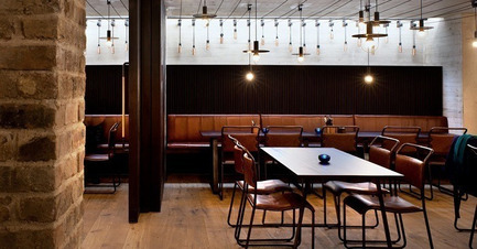 Press kit | 1124-07 - Press release | Winners Announced - World Interiors News - Commercial Interior Design -  WINNER - LEISURE OR ENTERTAINMENT VENUES<br>THE EVERYMAN THEATRE<br>by Haworth Tompkins with Citizens Design Bureau, United Kingdom<br>‘A space that encourages social interaction while the structure, materials and finishes play a supporting role – tasteful and robust.’  - Photo credit:  Haworth Tompkins with Citizens Design Bureau