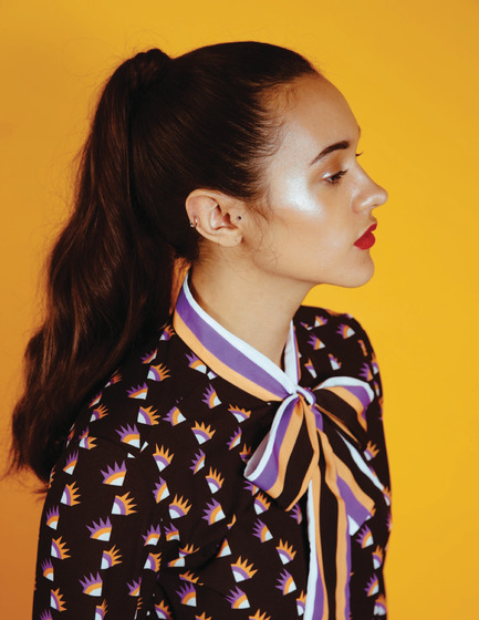 Press kit | 3867-01 - Press release | Sarah Donofrio to Debut New Accessory Collection - One Imaginary Girl - Fashion Design - Heritage Wink print bow blouse - Photo credit: Myles Katherine