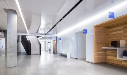 Press kit | 1152-02 - Press release | Understanding the creative use of light to define spaces - LumiGroup - Lighting Design -  View from the entrance, corridor leading to the staircase  - Photo credit: Stéphane Groleau