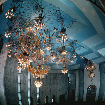 Press kit | 902-02 - Press release | A’ Design Awards 2014 Winners Announced - A' Design Award and Competition - Competition - Bridal Veil soaring over the World... <br>The chandelier by Victor A. Syrnev<br><br>PROJECT DESCRIPTION:<br>Great Hall in the Palace of Weddings in Bishkek (Kyrgyzstan). The ceiling of complex profile, reminiscent of cumulus clouds. Object-bridal veil organically included in the cloud space. The basis was taken from constructive module, like the flower of four leaves. Each leaf consists of five thin copper tubes. The Center of flower is light unit with different numbers of lamps, about 10 to 25 pieces Series connection of the leaves together has created a flexible and light chandelier in the shape of a bride's veil. - Photo credit: Victor A. Syrnev, 2013