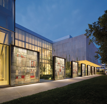 Press kit | 2073-09 - Press release | Discover the new Royal Alberta Museum - DIALOG - Institutional Architecture - Where the museum now stands where a former Canada Post main branch once sat. The exterior of that previous building featured nine mosaic murals by Ernestine Tahedl, commissioned by the federal government in 1966. These remarkable mosaics were carefully deconstructed and catalogued in 2012 to be incorporated into the new museum. They were restored, reframed, and reinstalled within inches of their original location, and incorporated into the design as a delightful feature along the pedestrian promenade and a screen for the cafe patio. - Photo credit: Tom Arban Photography Inc