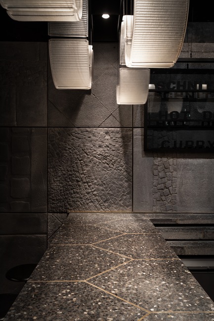 Press kit | 3823-01 - Press release | Berlin Bar, Moscow - Thilo Reich - Commercial Interior Design - Wall imprints and polished bar counter top made from original Berlin pavement stones. - Photo credit: Ivan Erofeev