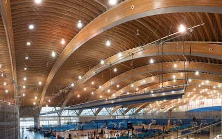 Press kit | 1615-05 - Press release | The Illuminating Engineering Society of BC announces its 2019 ‘Vision Award’ recipients - IESBC - Lighting Design - Before photo - The Richmond Olympic Oval is a large multi-use indoor sports facility with nineteen activity zones comprised of ice rinks, basketball courts, running tracks, and indoor soccer areas within an open space. Lighting was provided by three hundred 750 watt metal halide acrylic domed highbays, which required costly annual relamping to maintain consistent illumination levels.   - Photo credit: Rod Preston