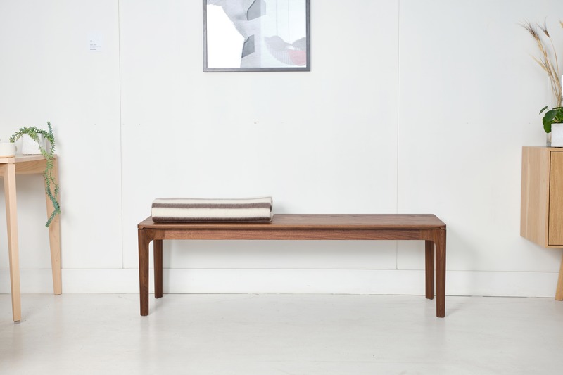 Press kit | 1077-07 - Press release | Creative form meets functionality with the Cove Collection by Kastella - Kastella - Product - C112 bench shown in American Black Walnut - Photo credit: Adam Stein