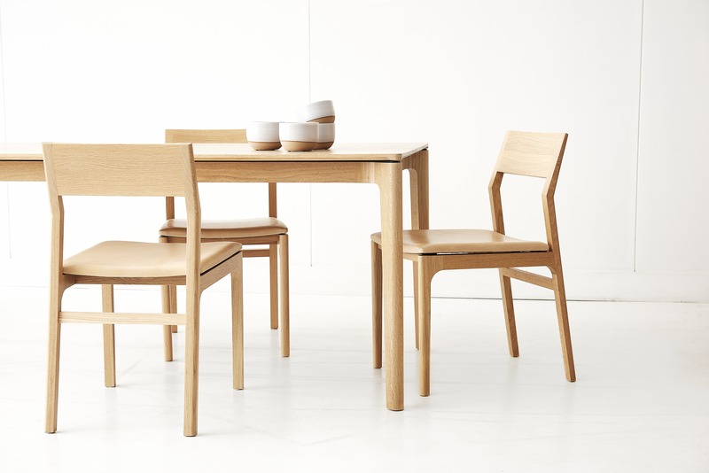 Press kit | 1077-07 - Press release | Creative form meets functionality with the Cove Collection by Kastella - Kastella - Product - T113 table & C205 chairs shown in American White Oak - Photo credit: Adam Stein