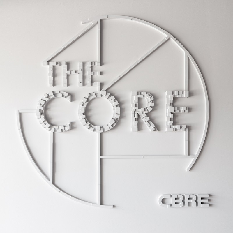 Press kit | 4695-01 - Press release | Sustainable transformed office The Core wins two Frame Awards - Large Office of the Year - CBRE Netherlands - Commercial Interior Design - Entrance - 3D-printed logo The Core - Photo credit: Stijnstijl Photography